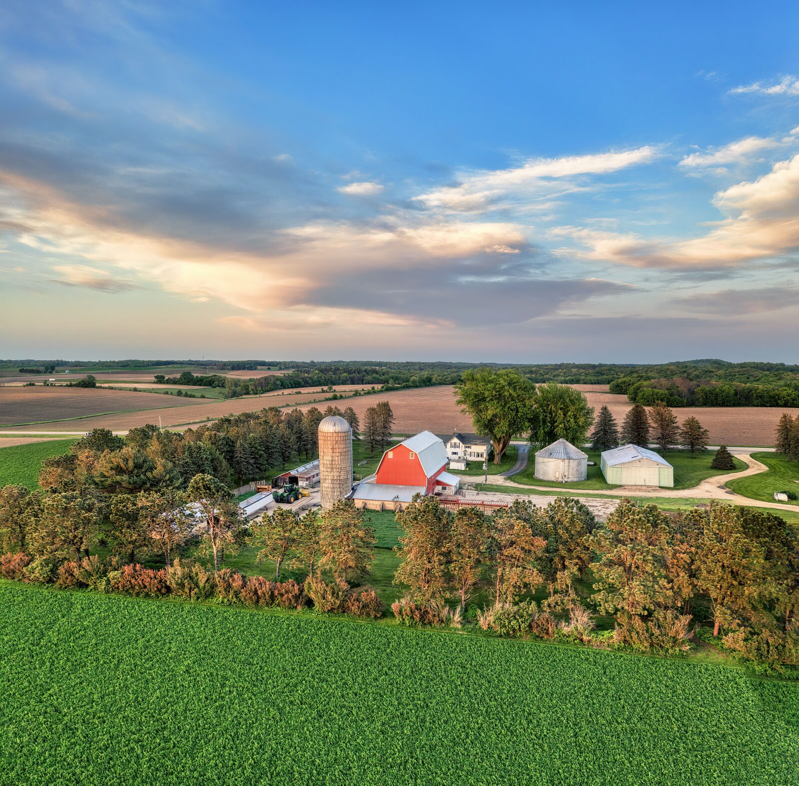 Aerial view of squared-off Midwestern cropland divided by property lines