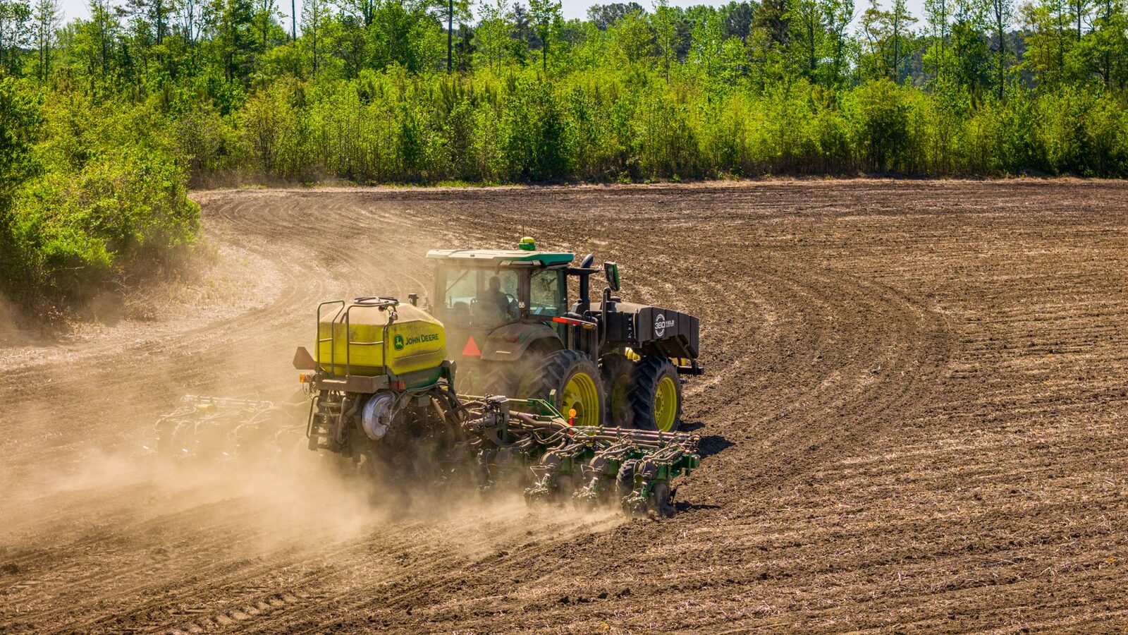 Farm tractor in field, representing equipment access and repair rights