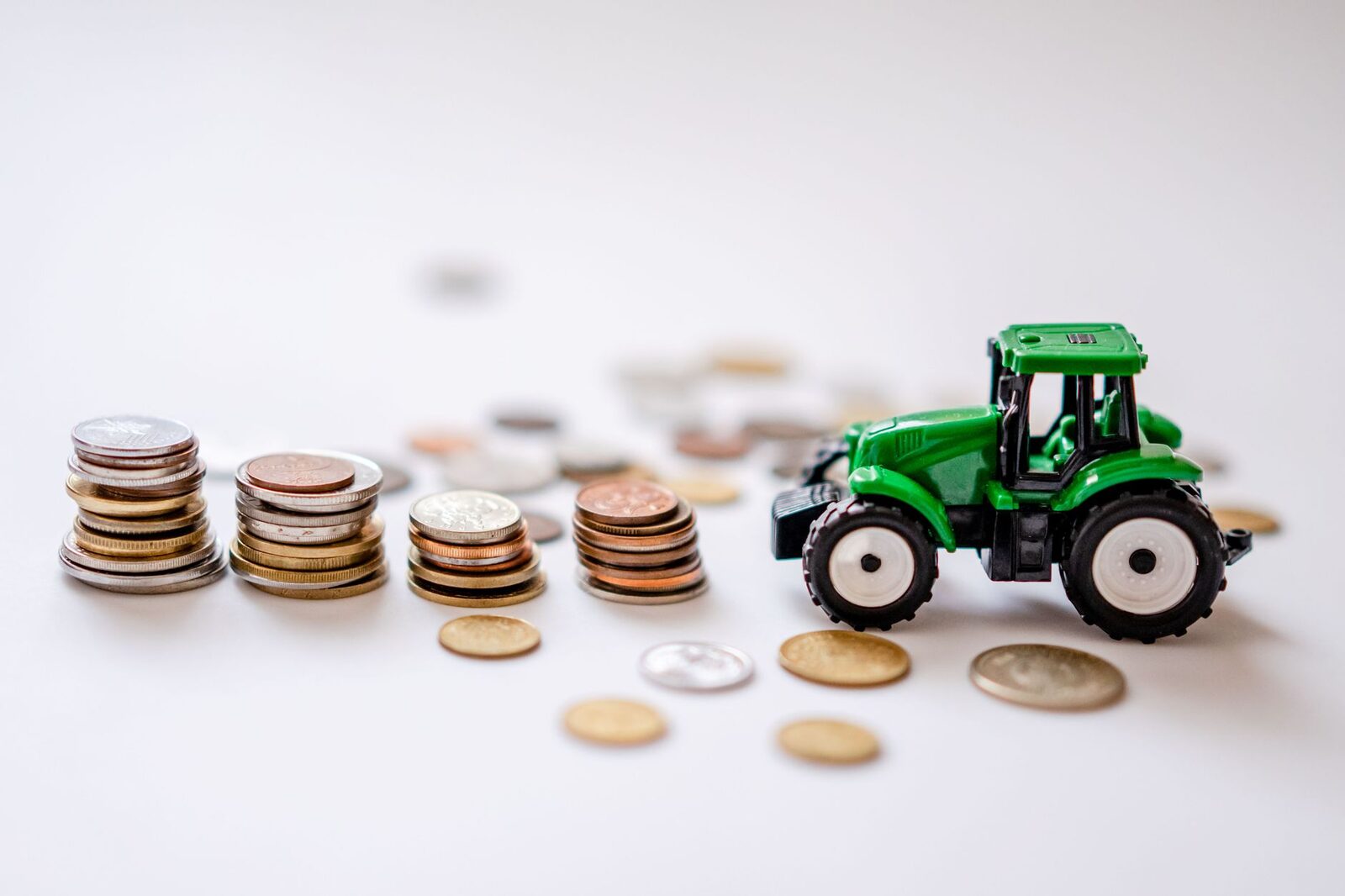 Farm equipment in a field during harvest